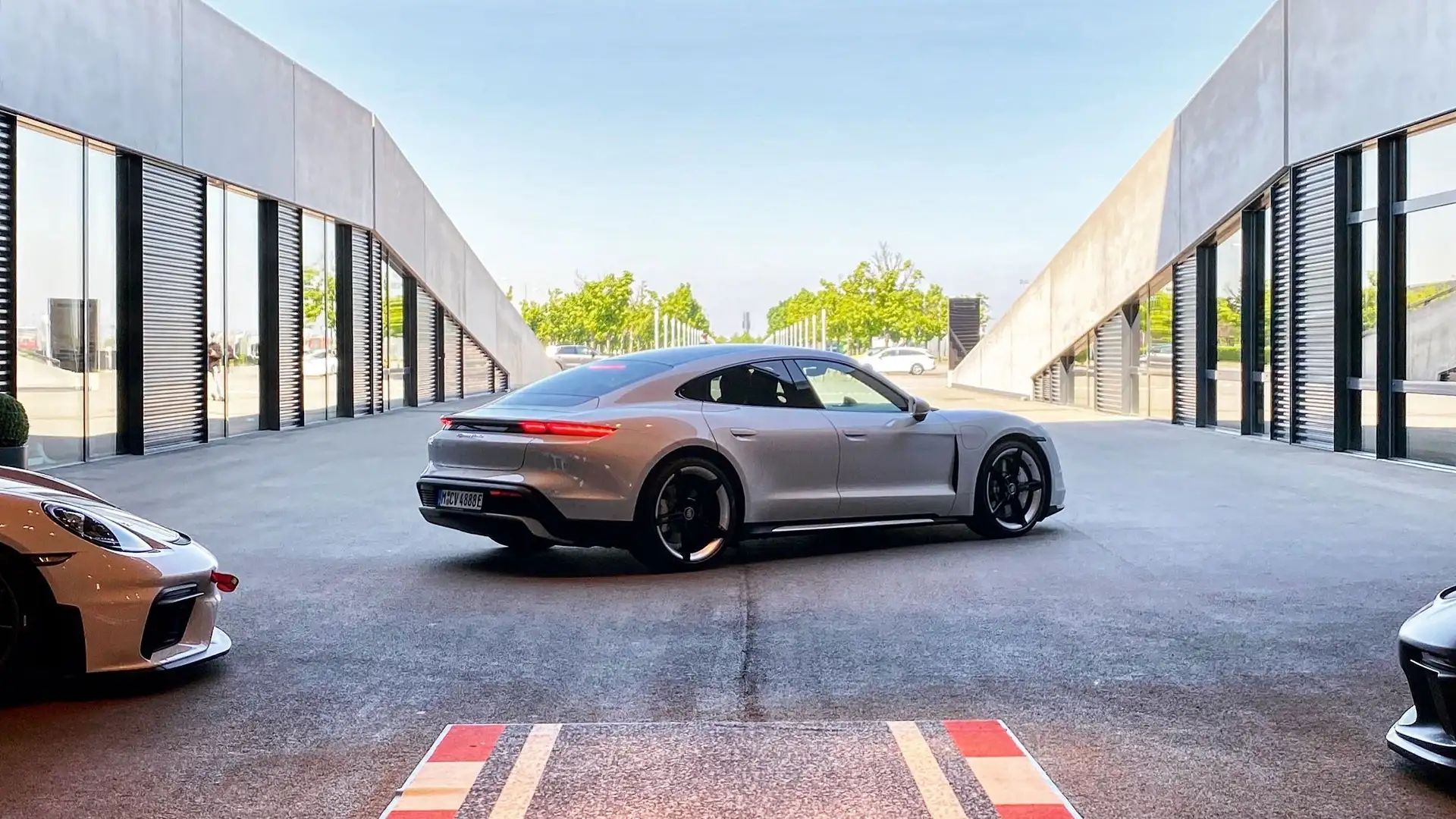 The Porsche Taycan photographed from behind on collection.